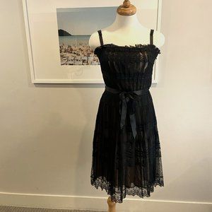 Black BCBG MAXAZRIA lace midi dress, with ribbon tie.